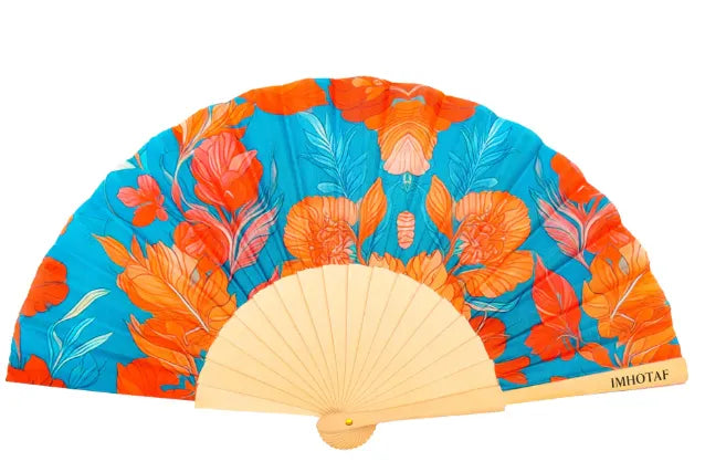 Embrace Elegance with the Azure Garden Hand Fan from I’m Hot and Fabulous