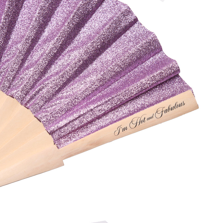 Purple glittery fabric with wooden handle and 'I'm Hot and Fabulous' text on a white background