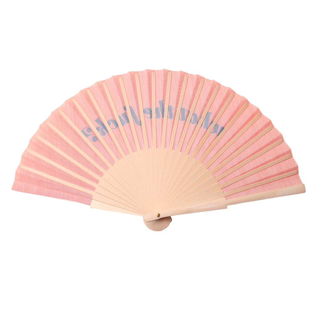 Orange hand fan on a white background