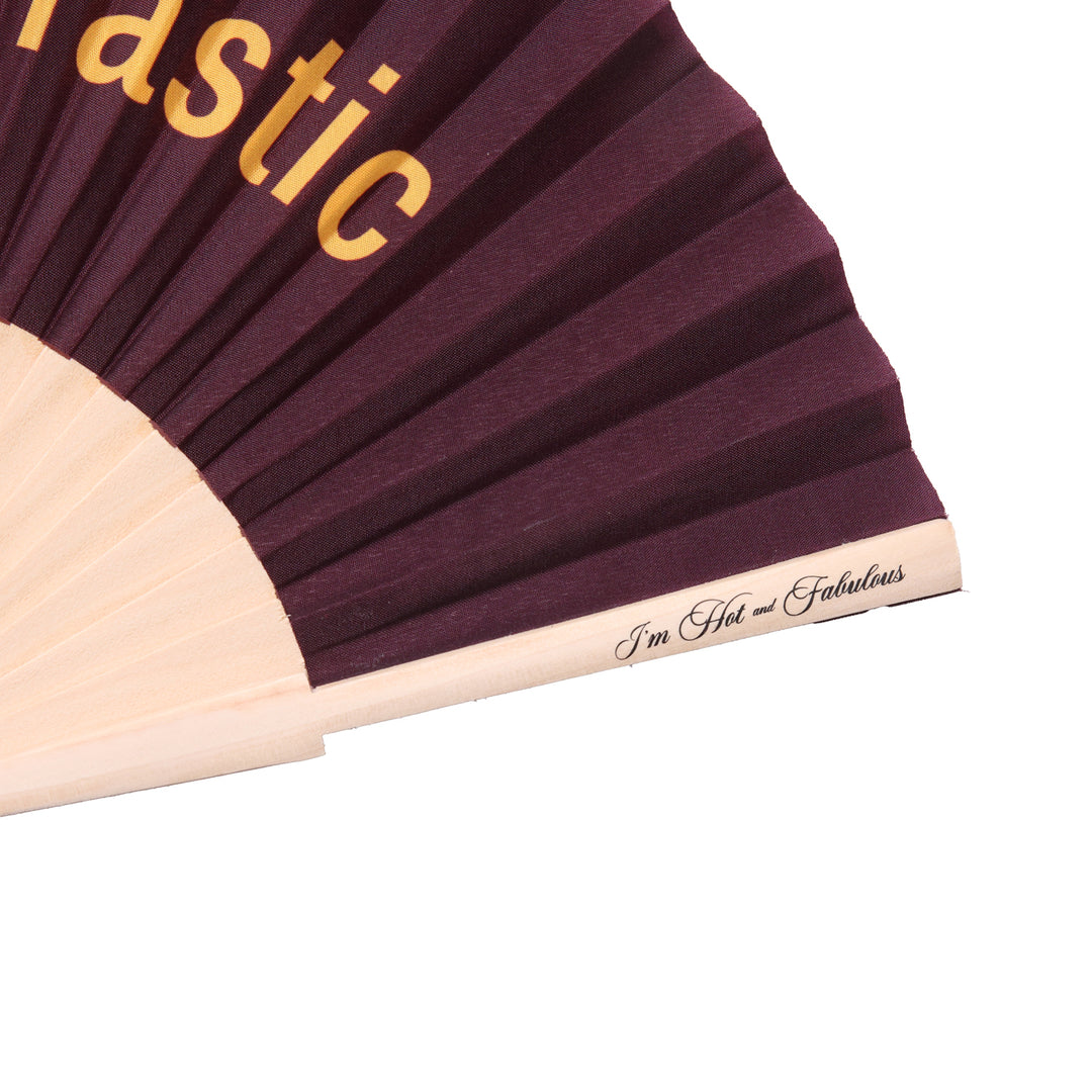 Maroon fabric with gold text and beige border on a white background