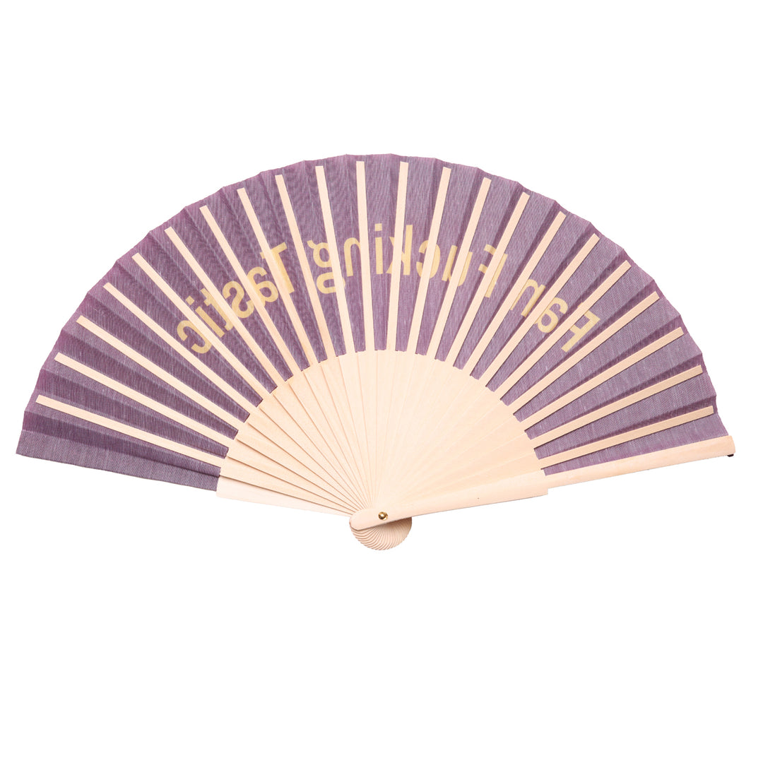 Purple and beige hand fan with text on a white background