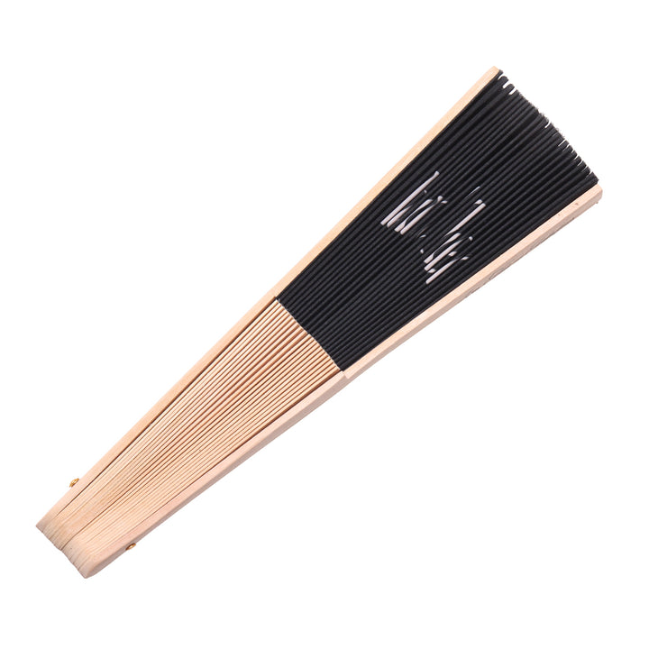 Long wooden brush with black bristles on a white background