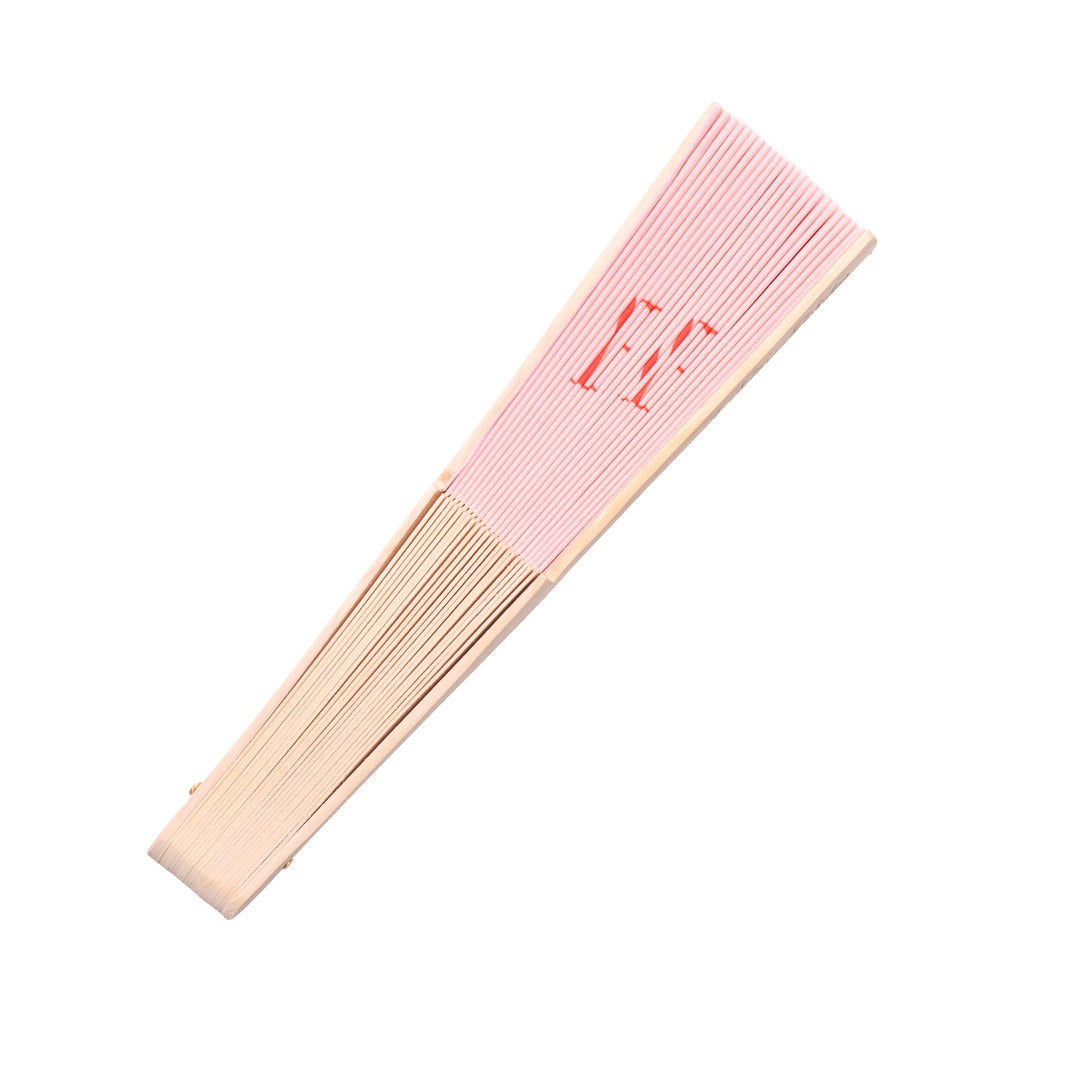 side view of pink fan that says more amor