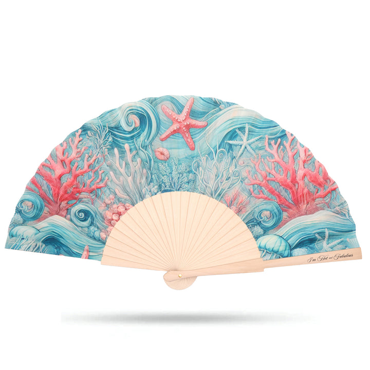 Handheld fan with ocean-themed design featuring coral and starfish on a white background