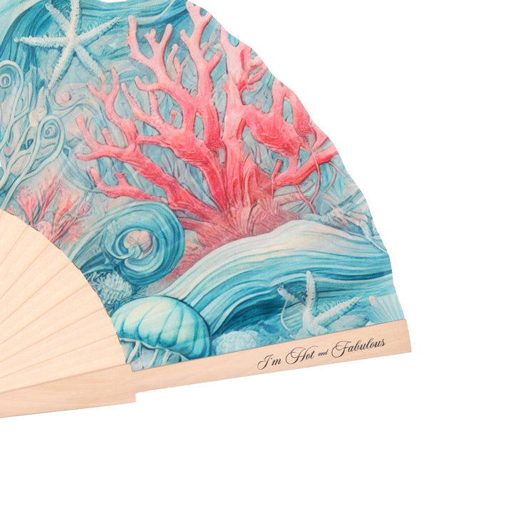Folded fabric with ocean-themed design featuring coral and shells, with 'I'm Hot and Fabulous' text on a white background.