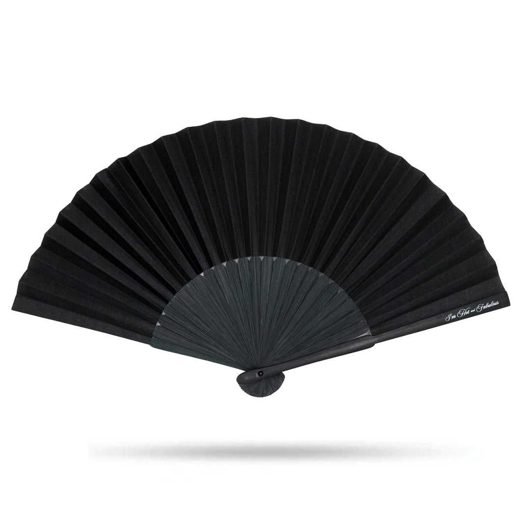 Black hand fan on a white background
