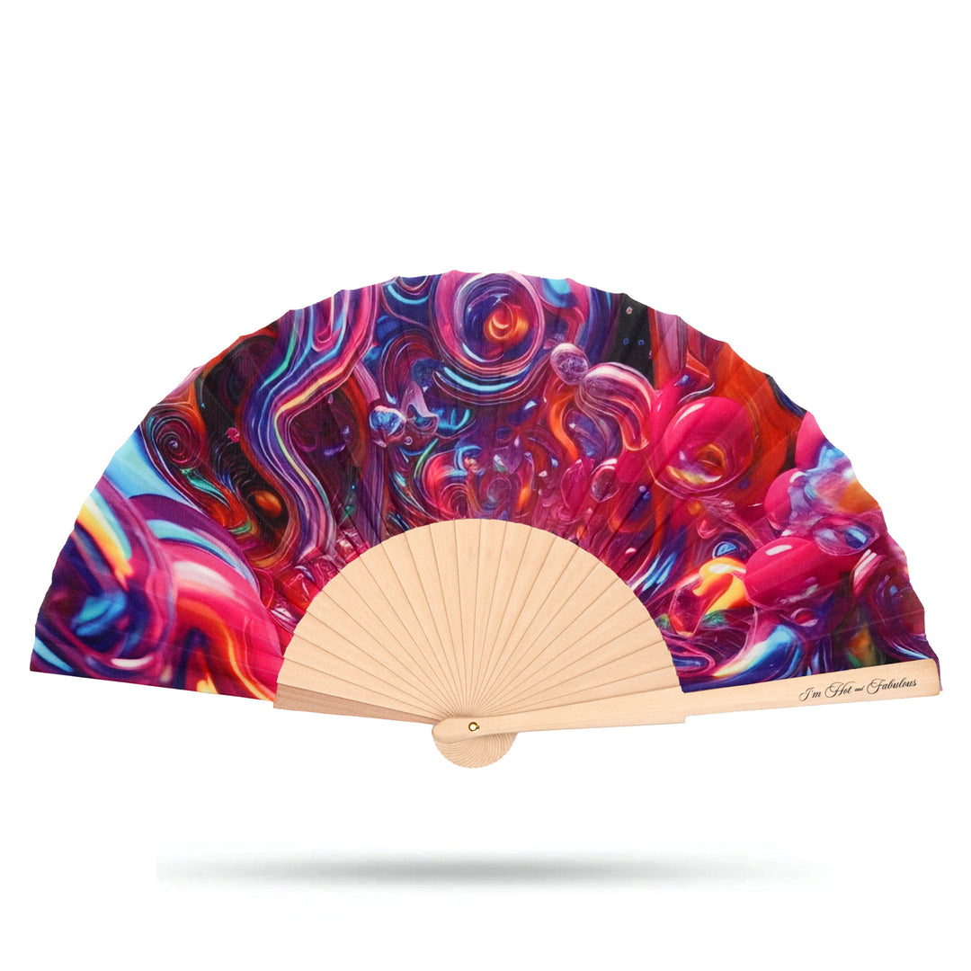 Colorful hand fan with abstract design on a white background