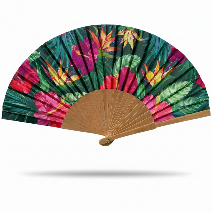 Handheld fan with tropical leaf design on a white background