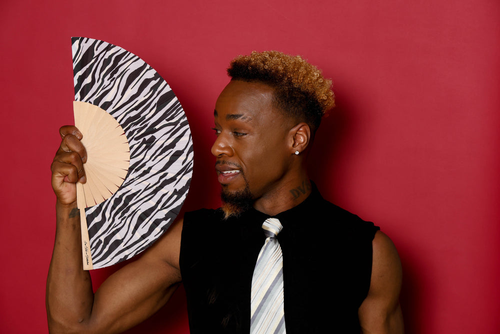 Man with Zebra Stripes Hand Fan
