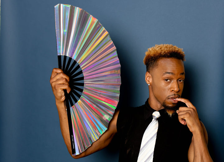 Man holding Holographic Disco Ball XL Hand Fan