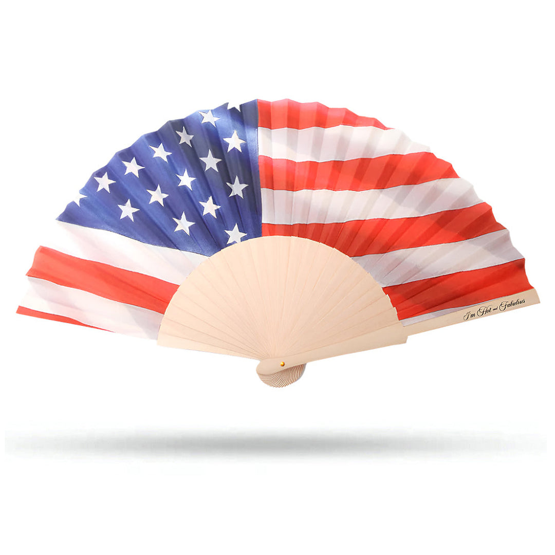 Handheld fan with American flag design on a white background