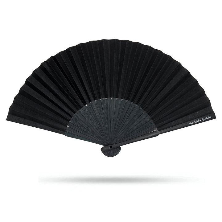 Black hand fan on a white background