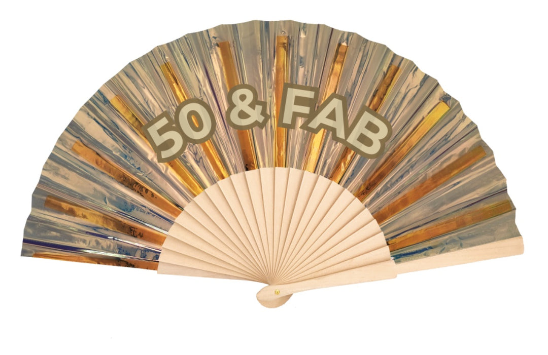 Custom gold holographic hand fan printed with 50 & FAB in arched lettering on natural wood ribs