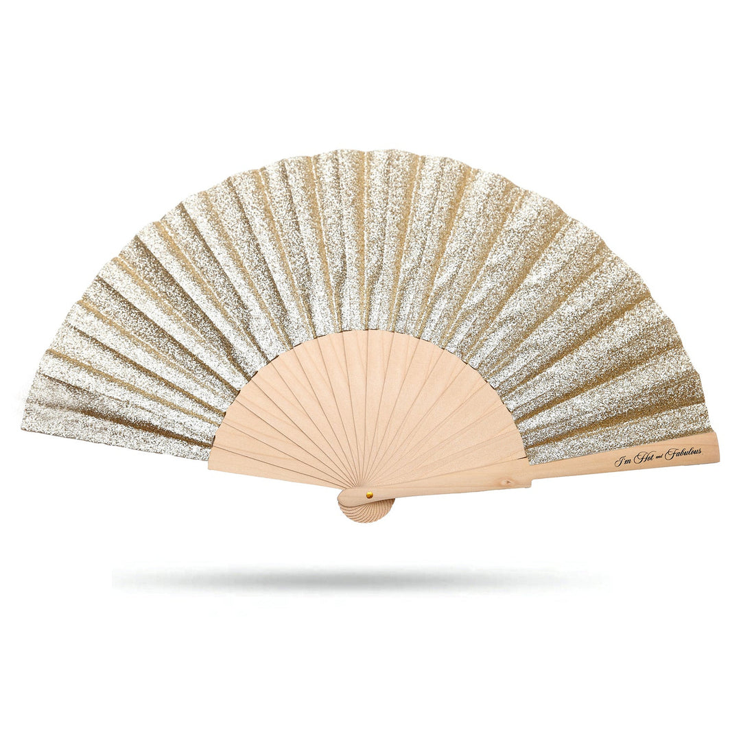 Handheld fan with glittery gold design on a white background