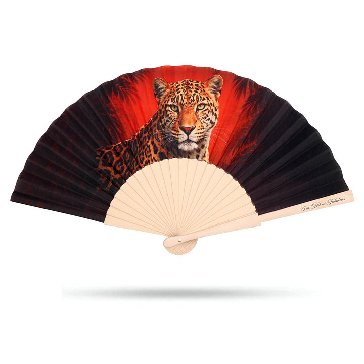 Hand fan with a leopard design on a red background