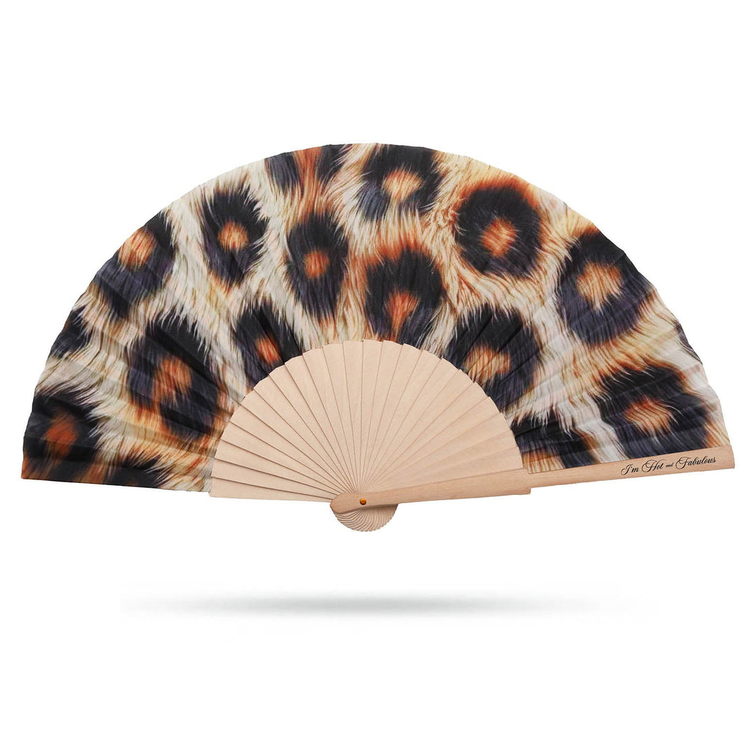 Handheld fan with luxury leopard print design on a white background