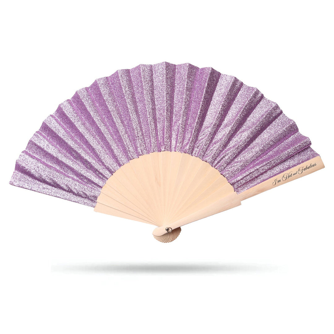 Purple and beige hand fan on a white background