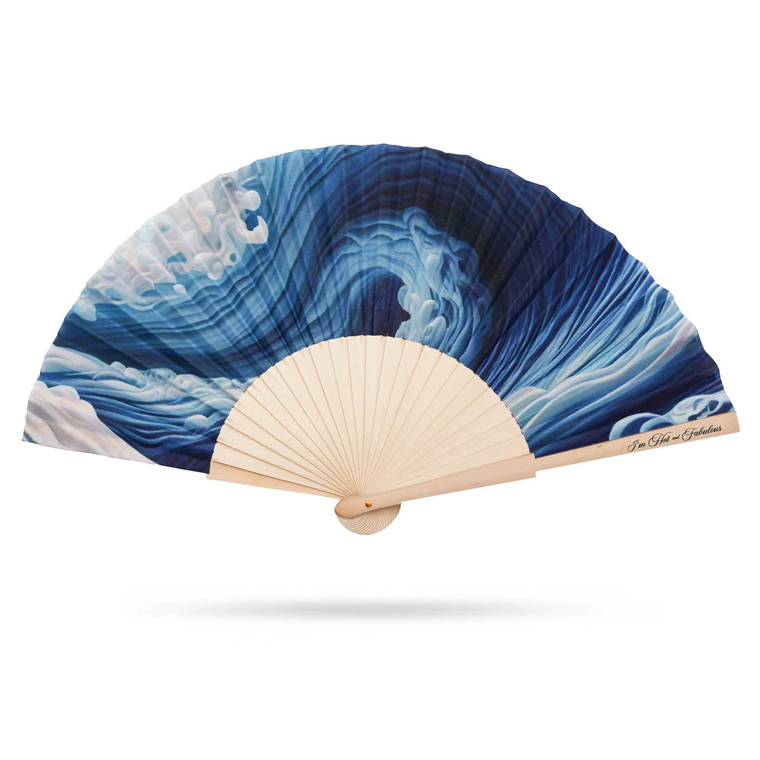 Handheld fan with blue wave design Surf Symphony on a white background