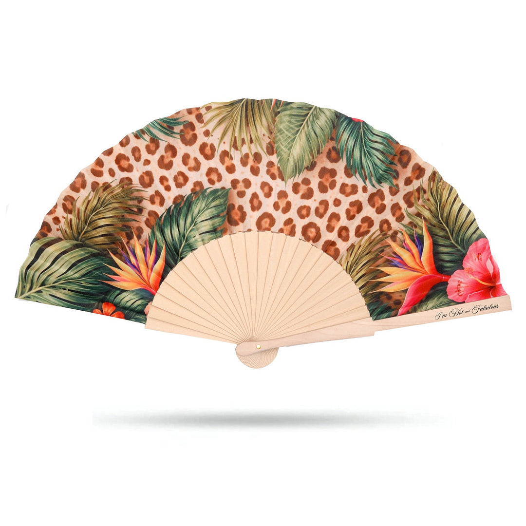 Handheld fan with leopard print and tropical leaf design on a white background